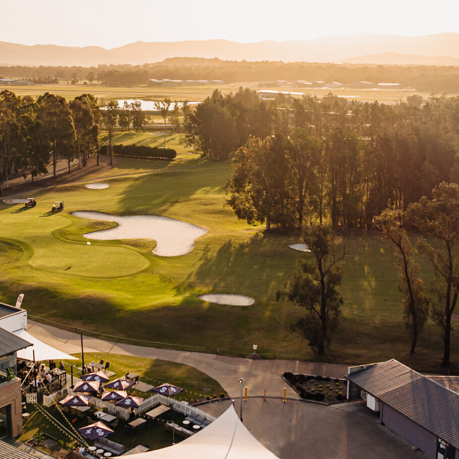 Aerial view of Lovedale Bar + Grill and adjacent golf course on a sunny afternoon in Hunter Valley